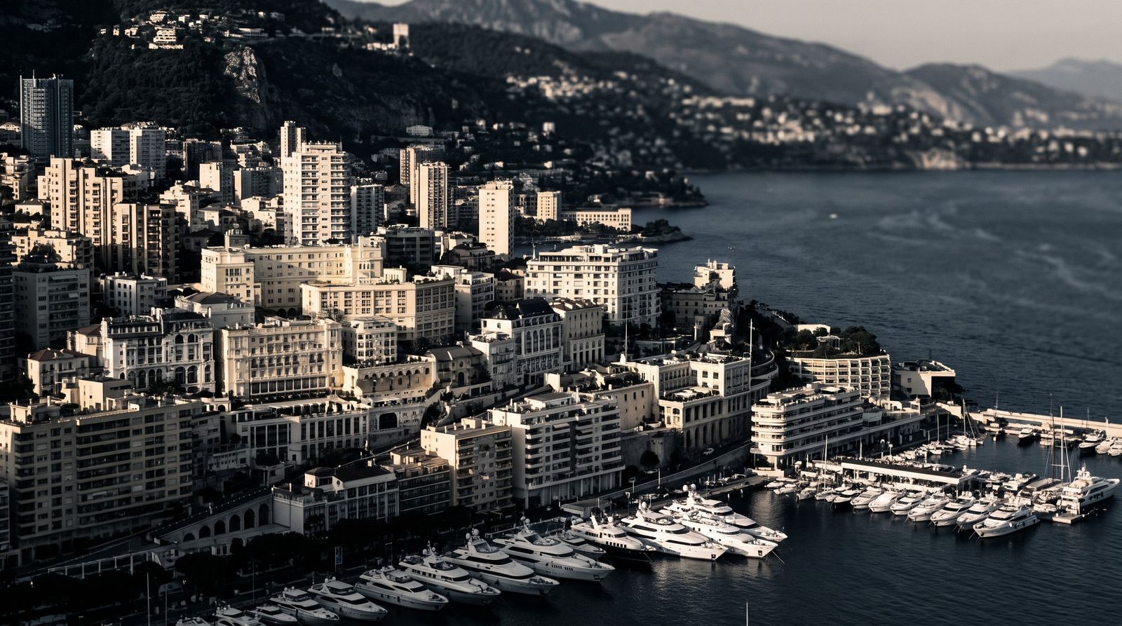 Panorama of Monaco, the harbour and the buildings set against the Rock
